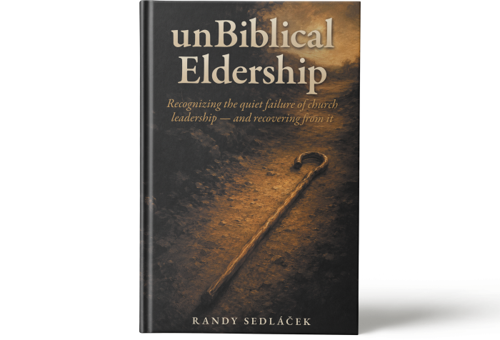 A hardcover copy of unBiblical Eldership by Randy Sedláček, standing upright